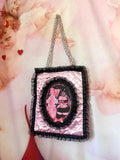 The Rhondas Pink and Black Quilted and Ruffle With Chain Handle Purse Hand Bag