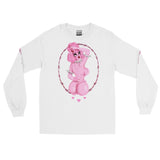 White cotton long sleeve shirt featuring a sexy pink poodle woman looking back. She has corset piercing on her back. It is in a pink oval Barbwire frame. Pink Barbwire on both sleeve 