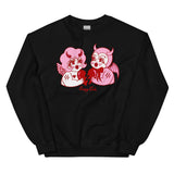 Black cotton and polyester unisex crew neck sweat shirt featuring kitschy pink and white devil cherub and a red devil holding each side of a red broken heart.