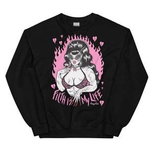 Unisex black cotton and polyester crew neck sweatshirt featuring a muscle lady with beehive hair and cat eye sunglasses surrounded by pink broken hearts with the words “Filth is My Life” under her. And pink flames in the background 