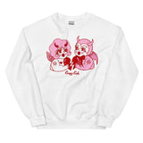 White cotton and polyester unisex crew neck sweat shirt featuring kitschy pink and white devil cherub and a red devil holding each side of a red broken heart.